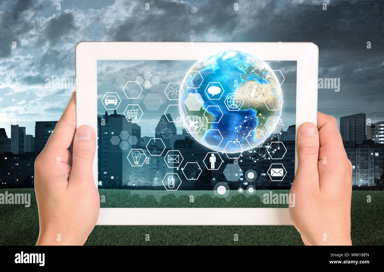 Man hands using tablet pc. Earth and hexagons with icons on touch ...