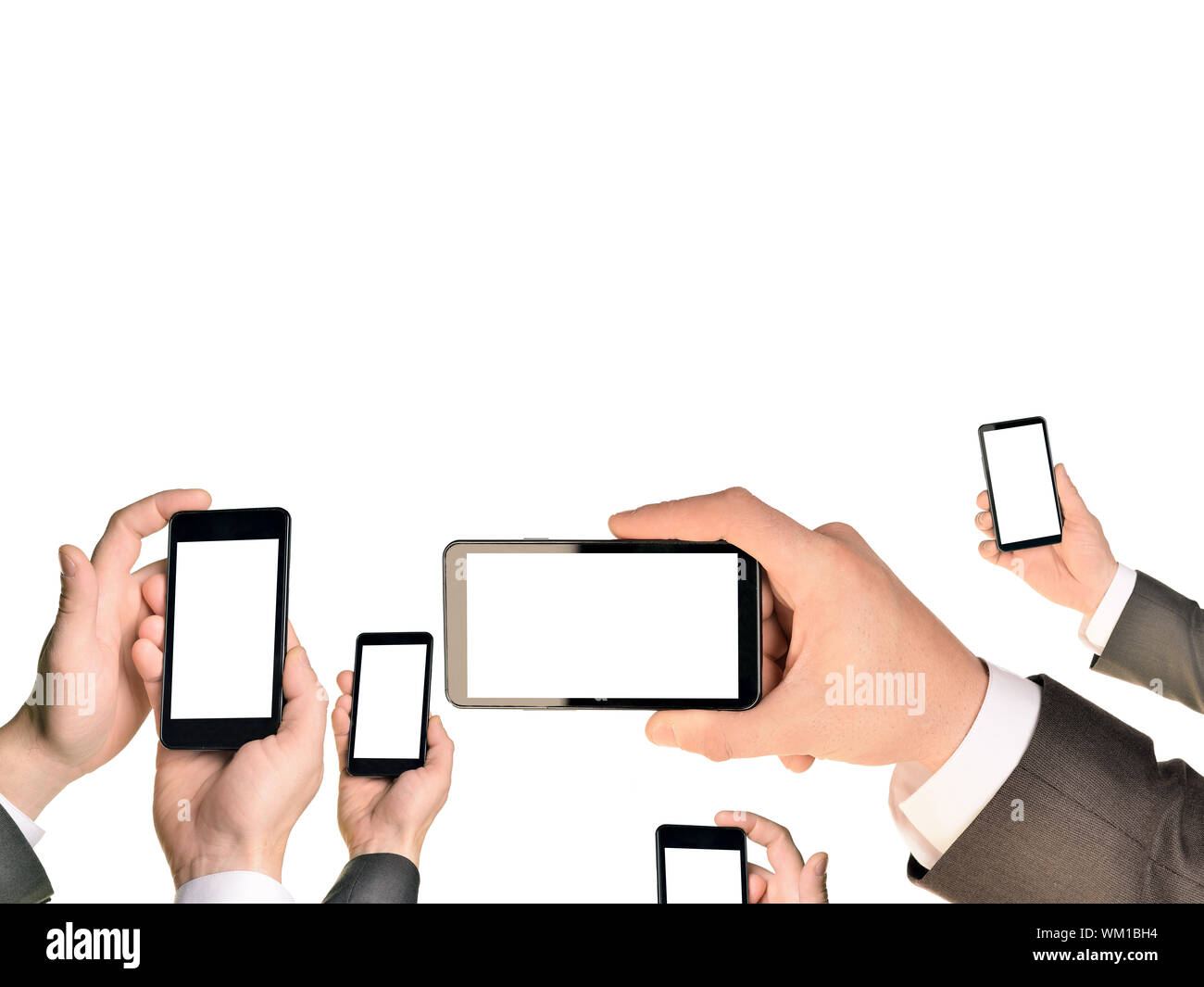 Mans hands using smart phones. Isolated on white background Stock Photo