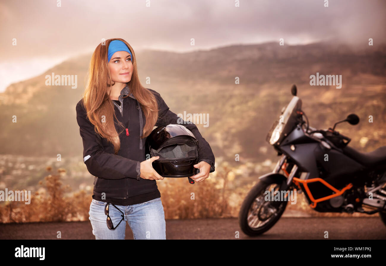 Beautiful biker girl Stock Photo