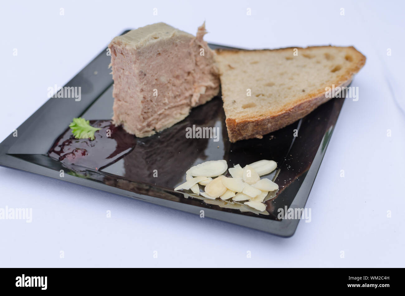 Duck pate with sauce of black berries and cranberries, rye bread recipe