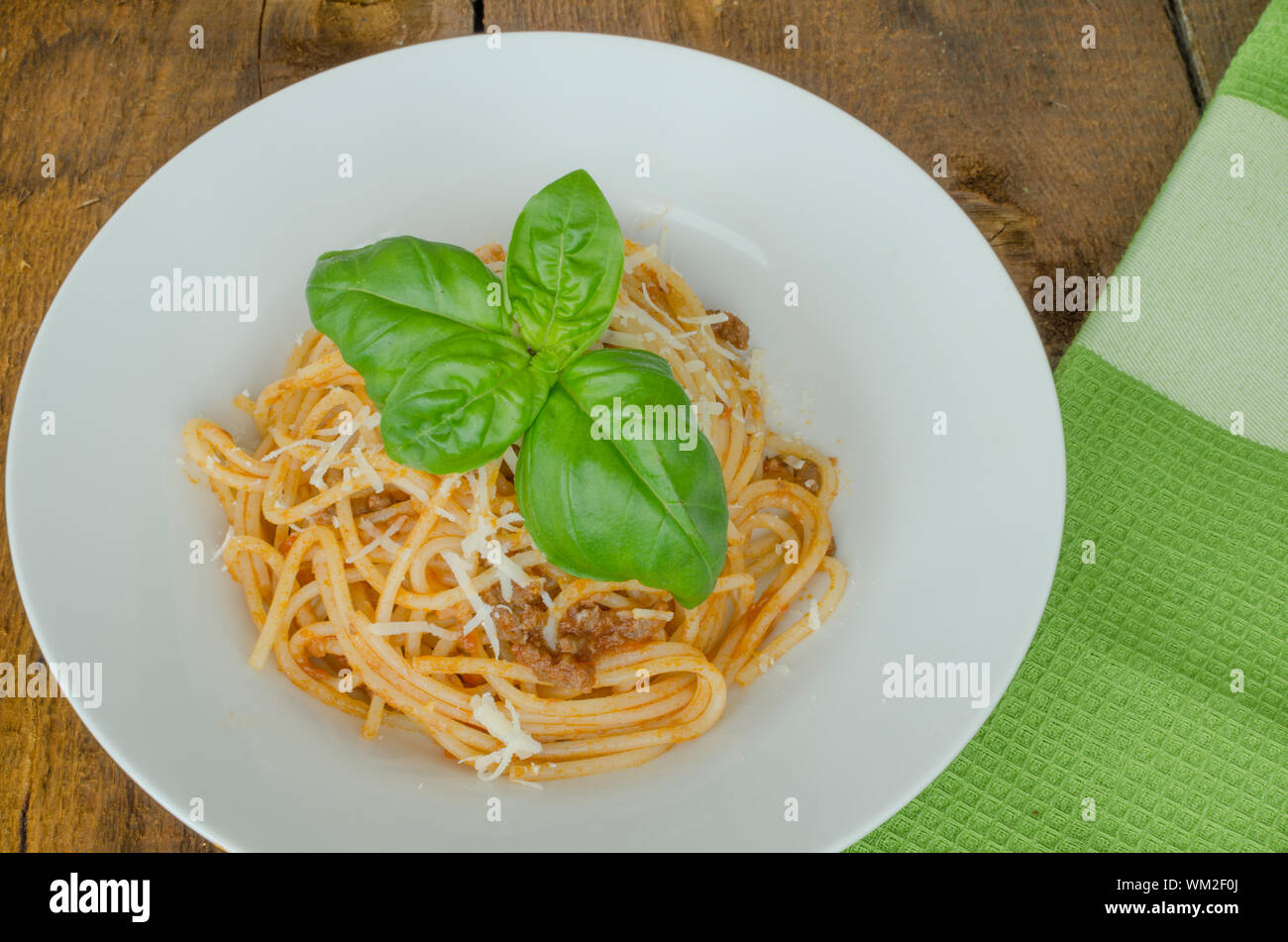 Spaghetti Bolognese with herbs, tomatoes, onions and vegetable Stock