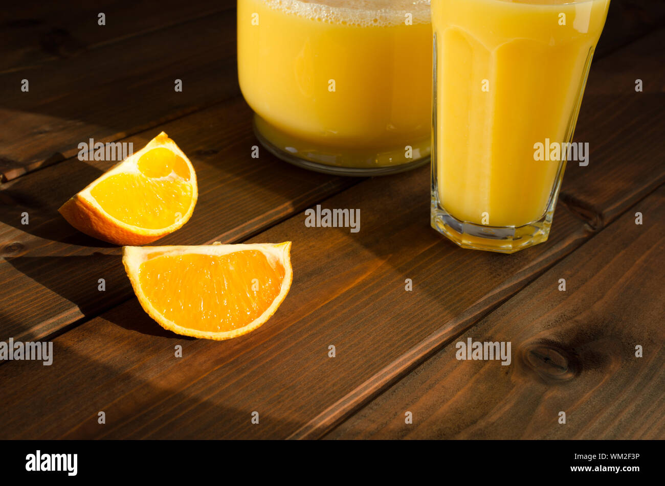 Simple picture orange with fresch juice on table Stock Photo