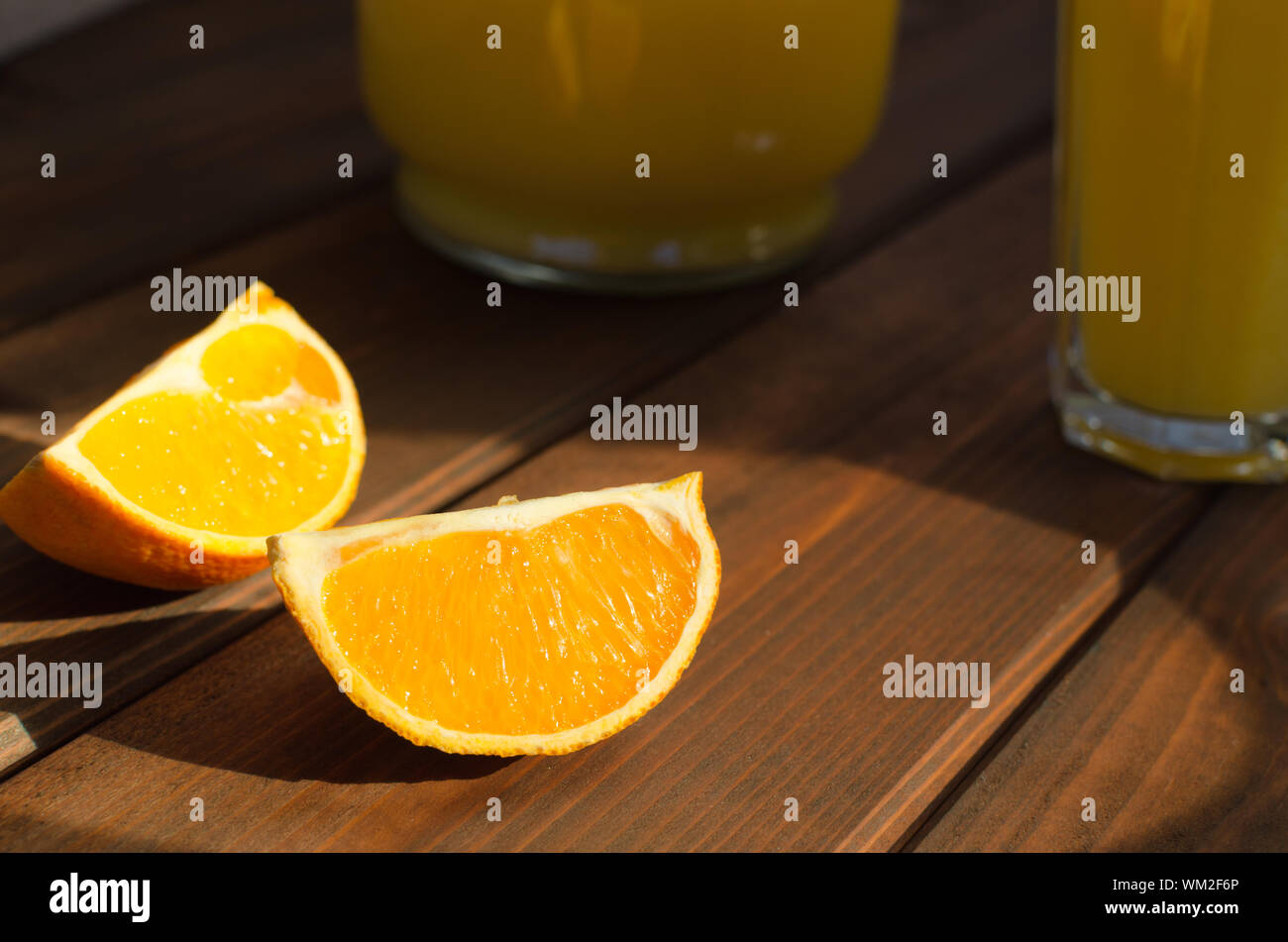 Simple picture orange with fresch juice on table Stock Photo