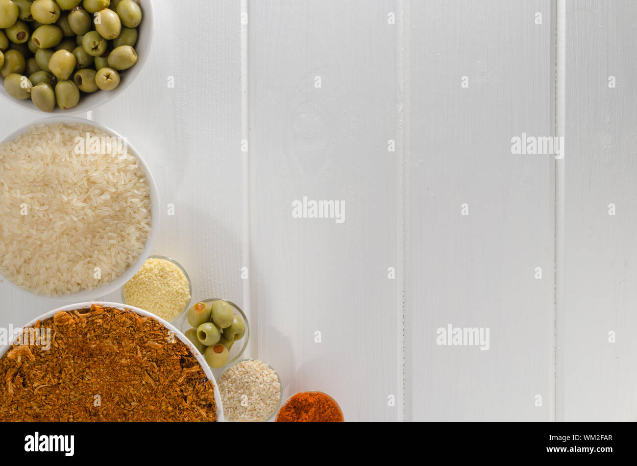 Spices on white wood, focus on all Stock Photo