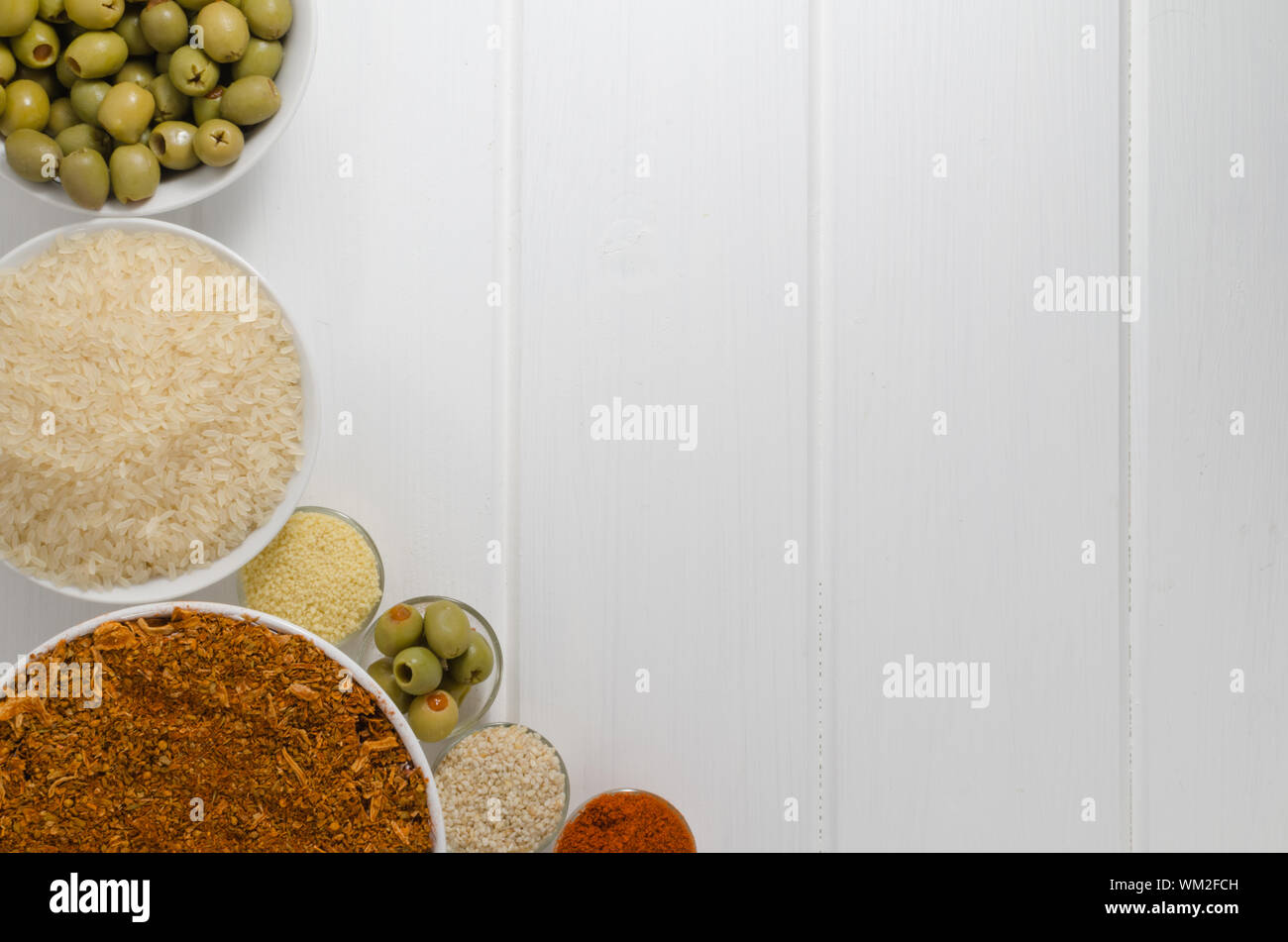 Spices on white wood, focus on all Stock Photo