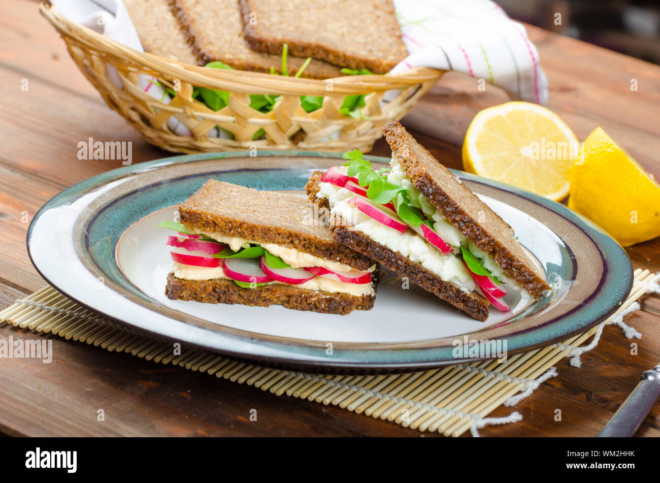 Healthy snack wholemeal bread with eggcream spread and fresh