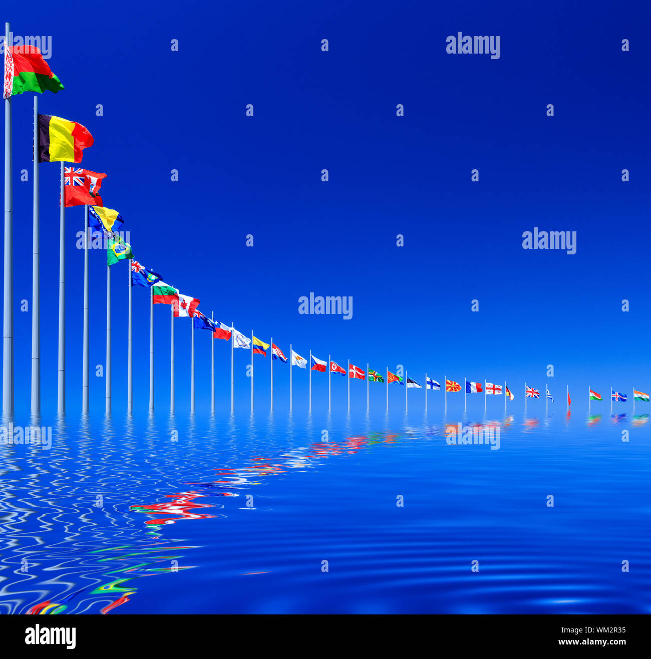 Flags against blue sky, copyspace Stock Photo - Alamy