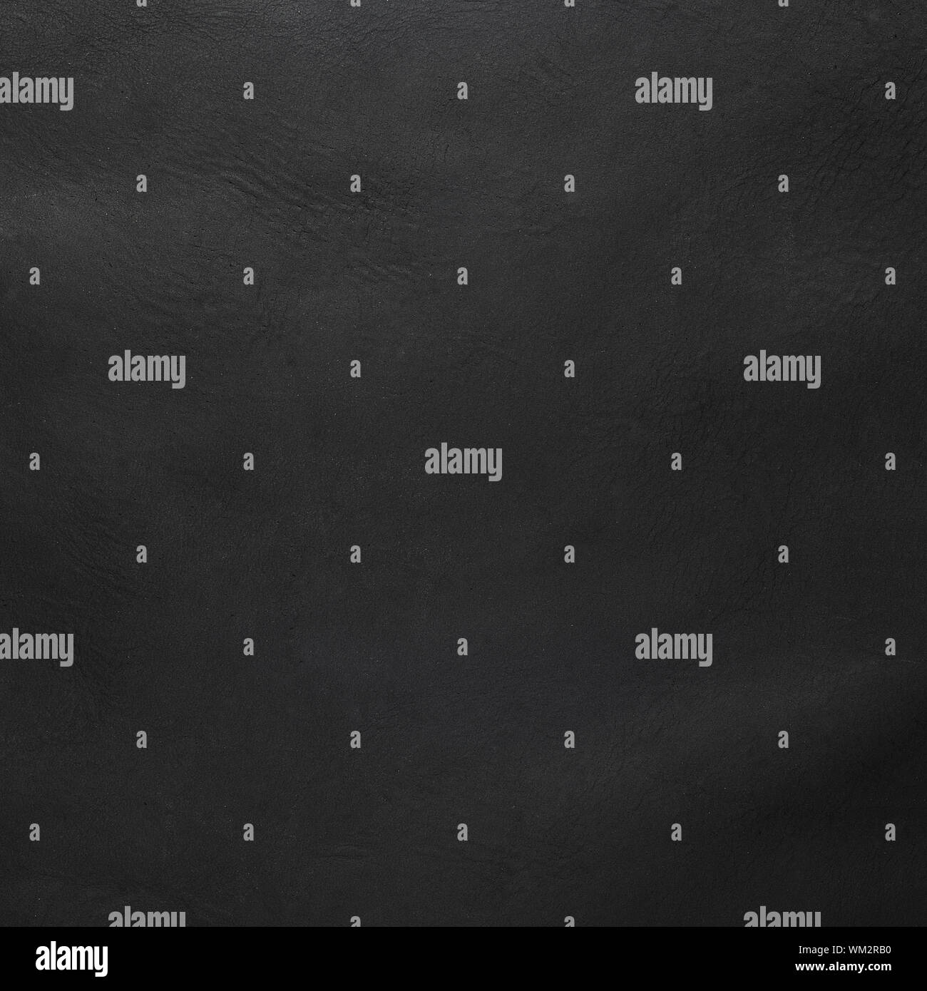 Natural qualitative black leather texture. Close up. Stock Photo