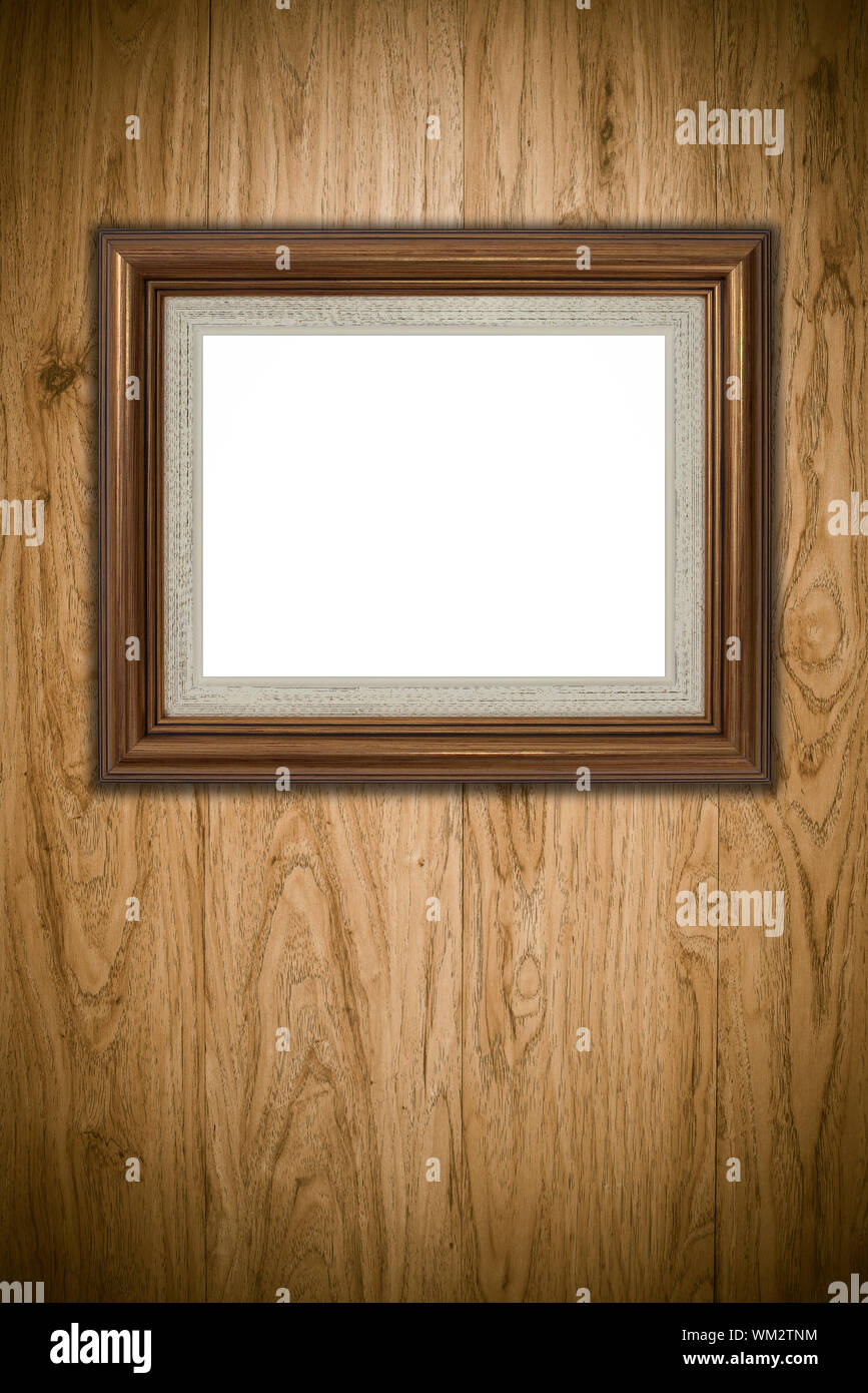 Old picture frame on vintage wood wall Stock Photo - Alamy