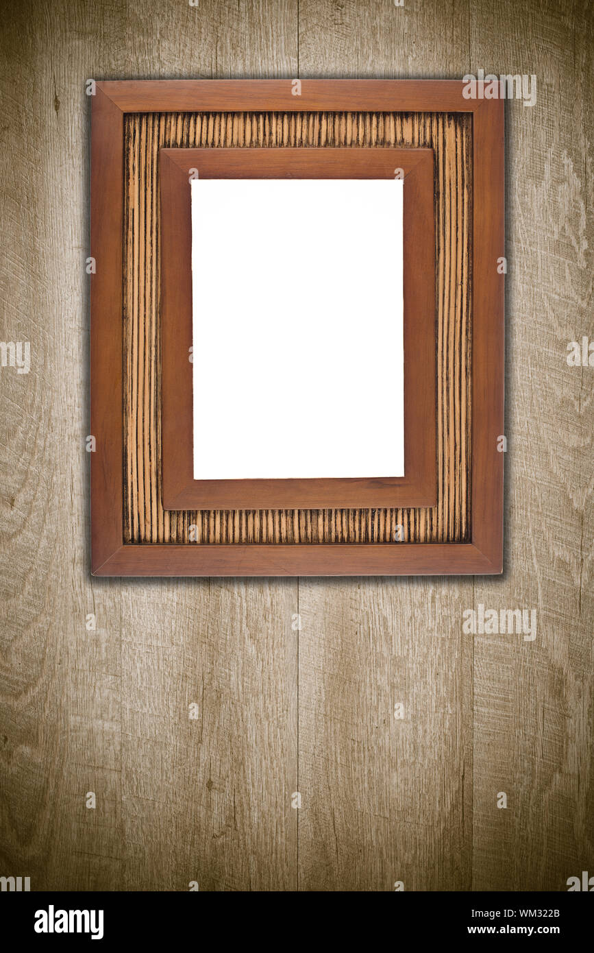 Old picture frame on vintage wood wall Stock Photo - Alamy
