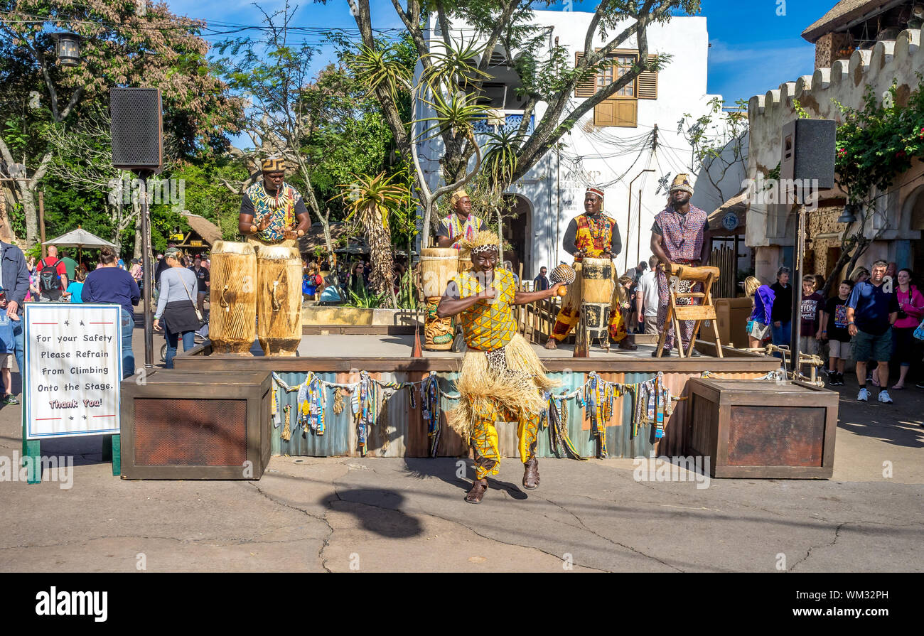Crowds enjoy the Animal Kingdom Theme Park at Disney World in Orlando Florida. Visible are buildings in the African section of the Park Stock Photo - Alamy Crowds enjoy the Animal Kingdom Theme Park at Disney World in Orlando Florida. Visible are buildings in the African section of the Park Stock Photo - Alamy