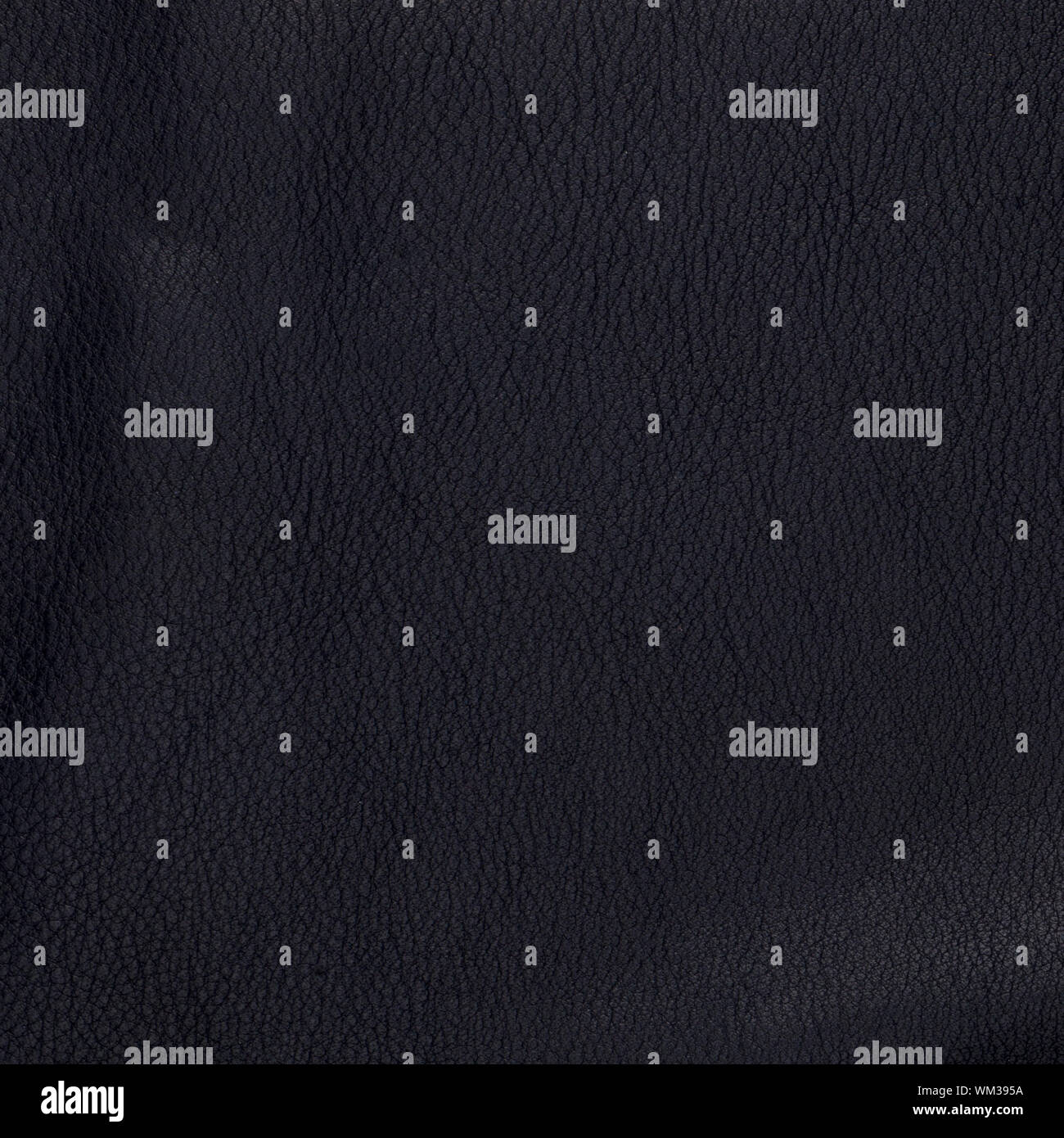 Natural qualitative black leather texture. Close up. Stock Photo