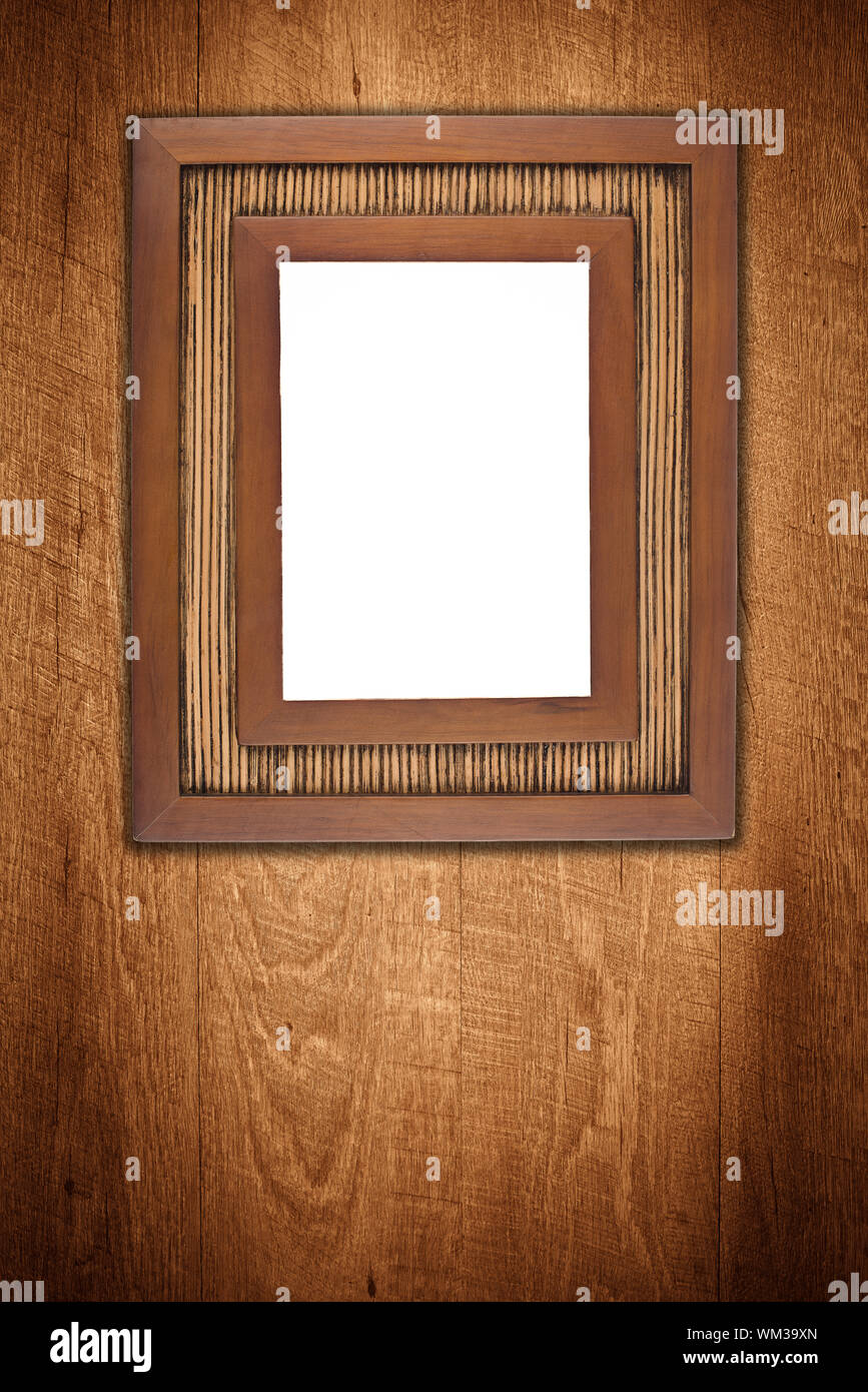 Old picture frame on vintage wood wall Stock Photo - Alamy