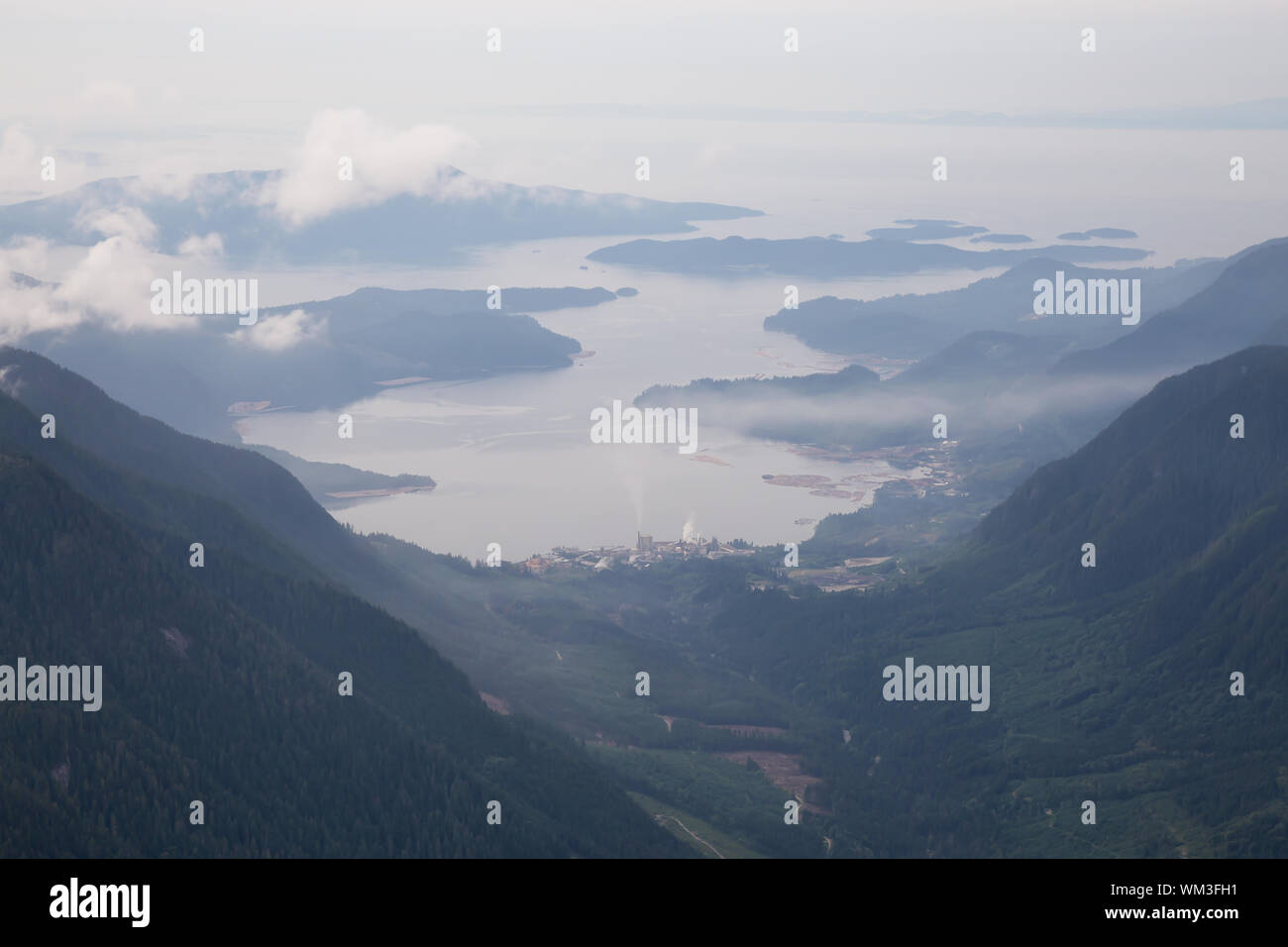 Aerial View of an Industrial Site in Howe Sound during a cloudy and