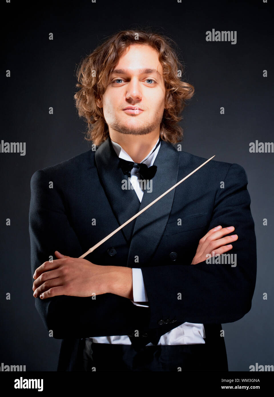 Portrait of a Young Conductor Holding a Baton Stock Photo Alamy
