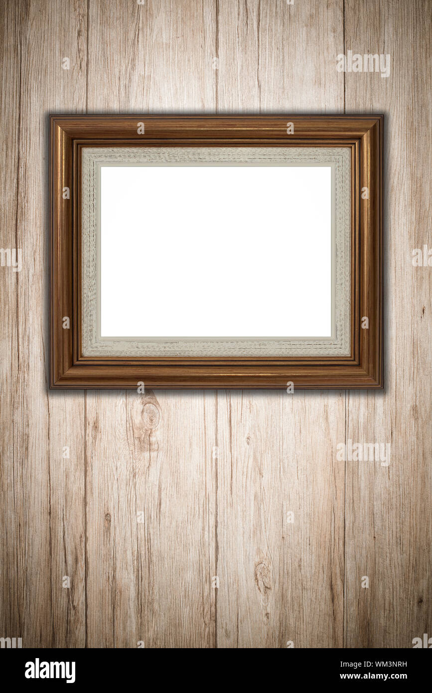 Old picture frame on vintage wood wall Stock Photo - Alamy