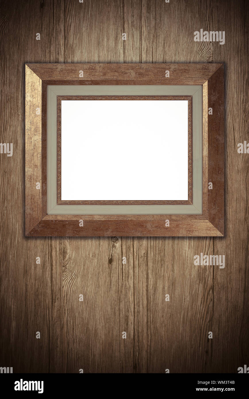 Old picture frame on vintage wood wall Stock Photo - Alamy