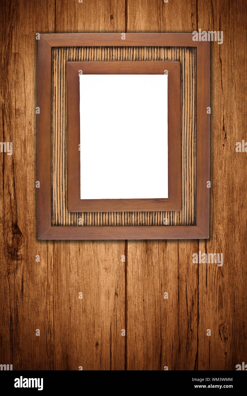 Old picture frame on vintage wood wall Stock Photo - Alamy