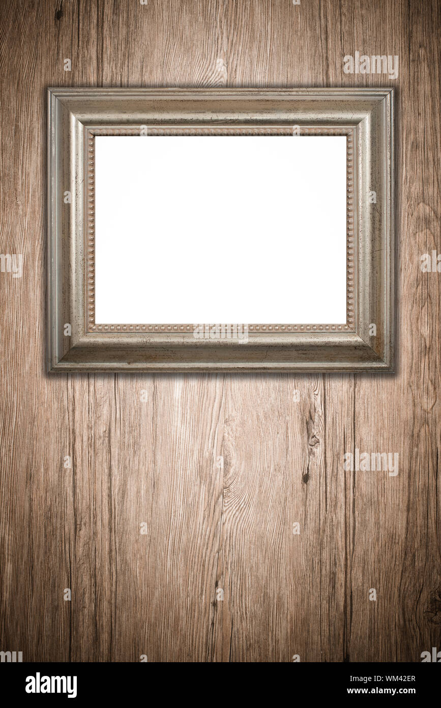 Old picture frame on vintage wood wall Stock Photo - Alamy