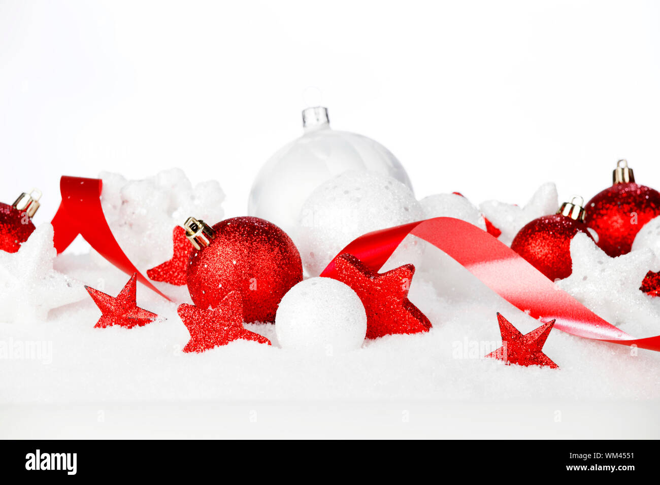 White and red christmas balls and decoration on snow Stock Photo - Alamy