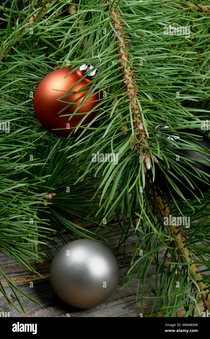Christmas Decoration With Orange And Silver Baubles Into Fluffy