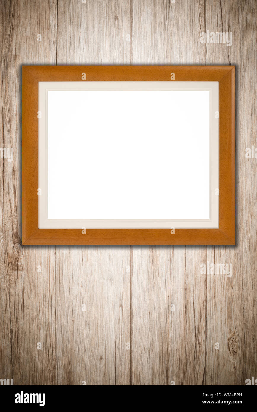 Old picture frame on vintage wood wall Stock Photo - Alamy