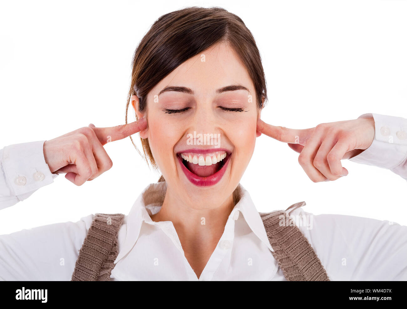 smiling young attractive model closing her eyes and ears on isolated