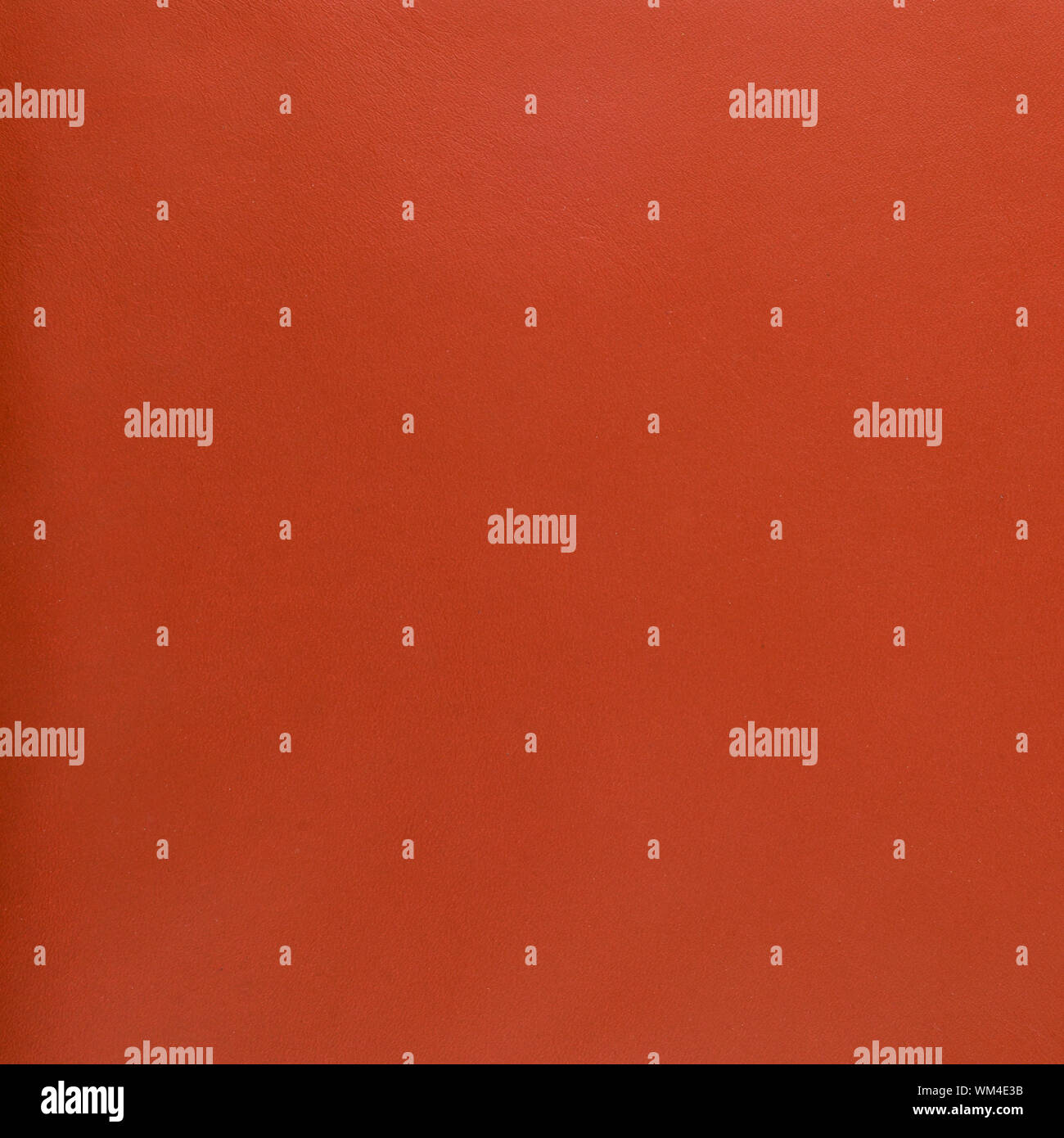 Orange leather texture closeup background. Stock Photo