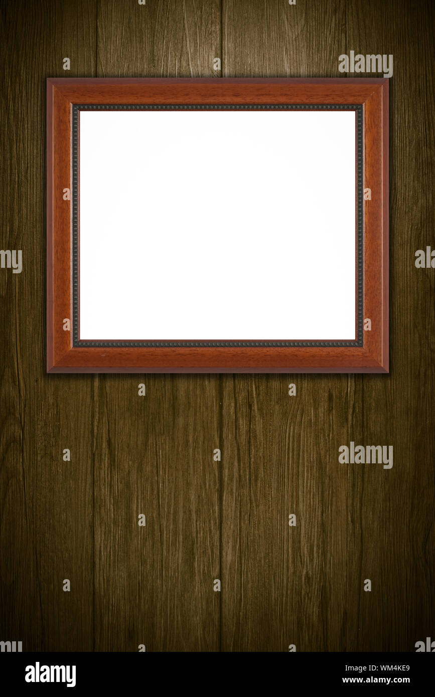 Old picture frame on vintage wood wall Stock Photo - Alamy