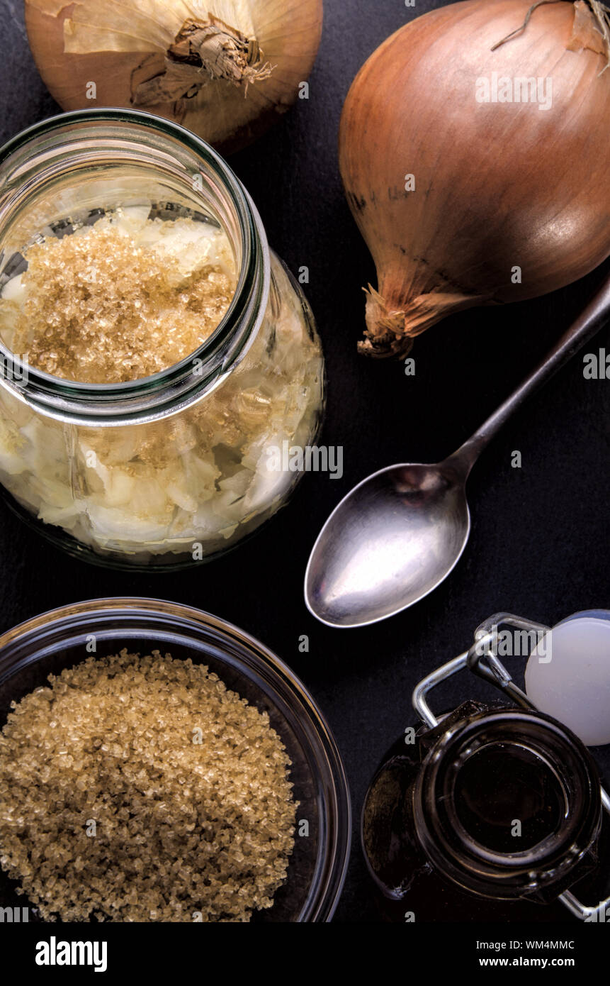 onions and brown sugar to make onion juice against cough Stock Photo