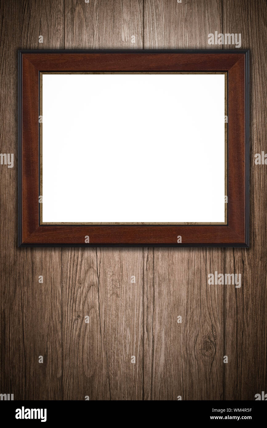 Old picture frame on vintage wood wall Stock Photo - Alamy