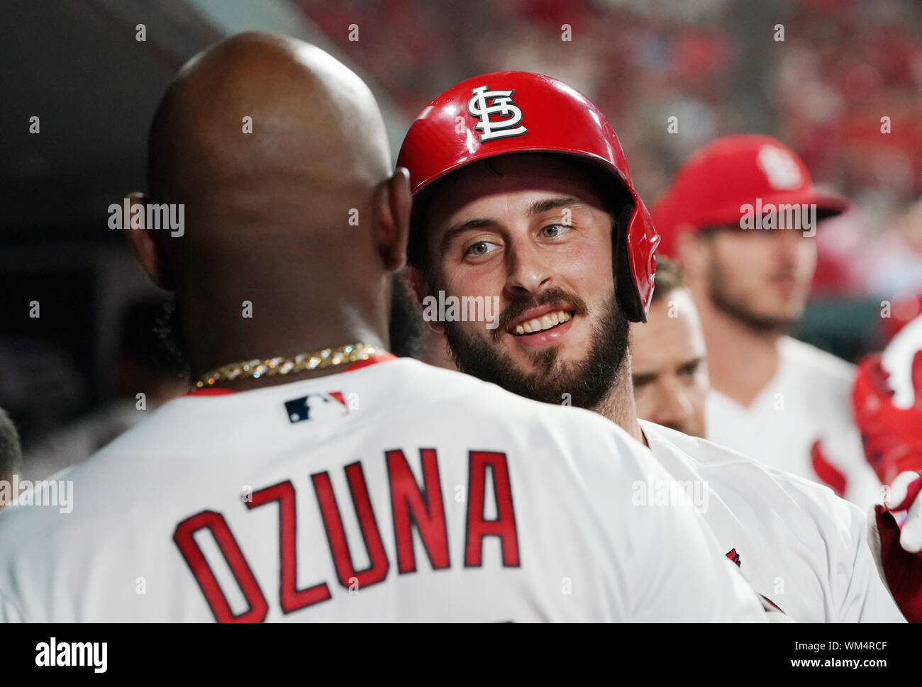 St. Louis, United States. 04th Sep, 2019. St. Louis Cardinals Paul DeJong is congratulated in the dugout by Marcell Ozuna after hitting a solo home run in the fourth inning against the San Francisco Giants at Busch Stadium in St. Louis on Wednesday, September 4, 2019. Photo by Bill Greenblatt/UPI Credit: UPI/Alamy Live News Stock Photo