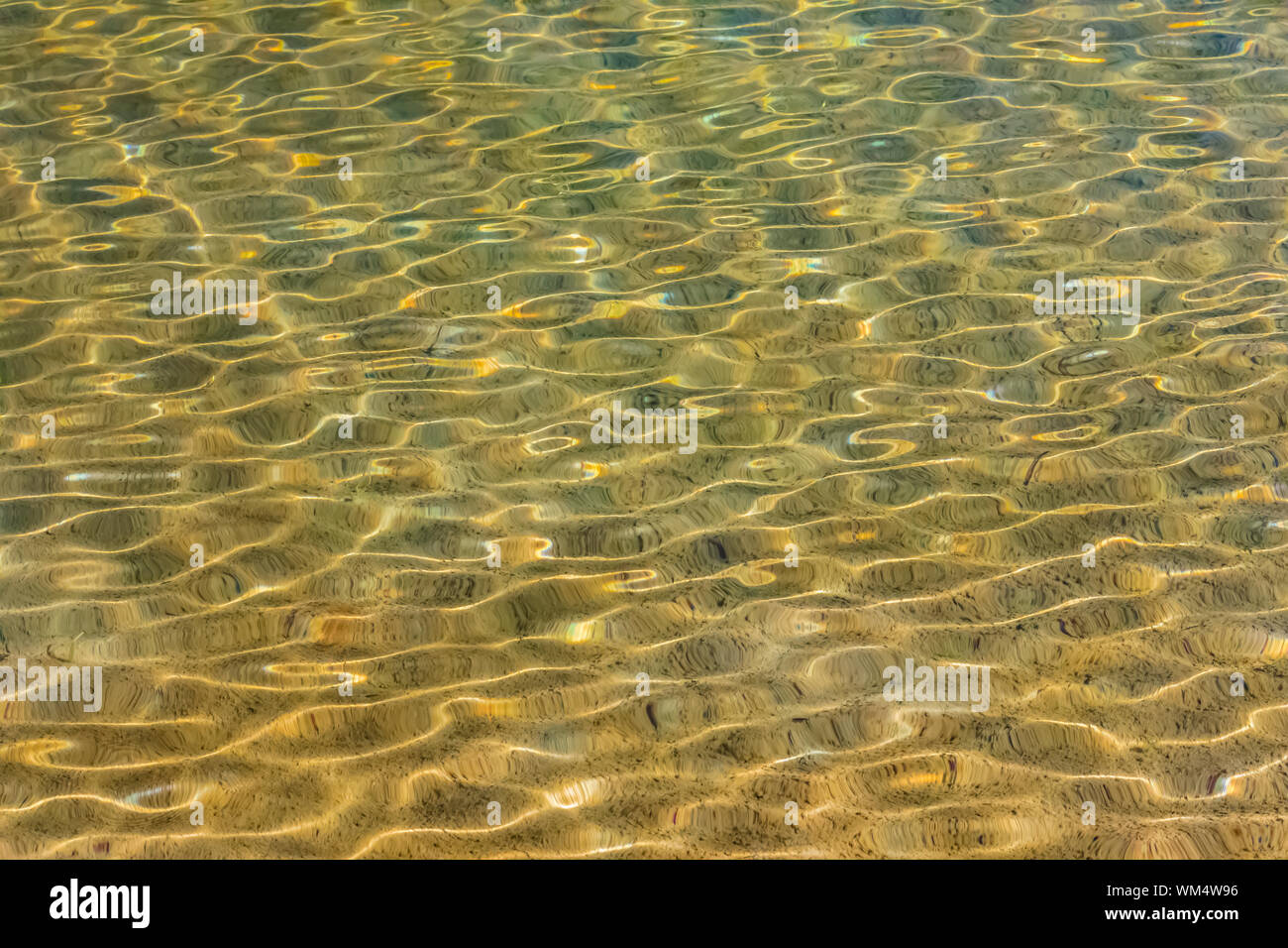 Gentle waves patterning one of the Tipsoo Lakes along the Naches Peak Loop Trail in Mount Rainier National Park, Washington State, USA Stock Photo