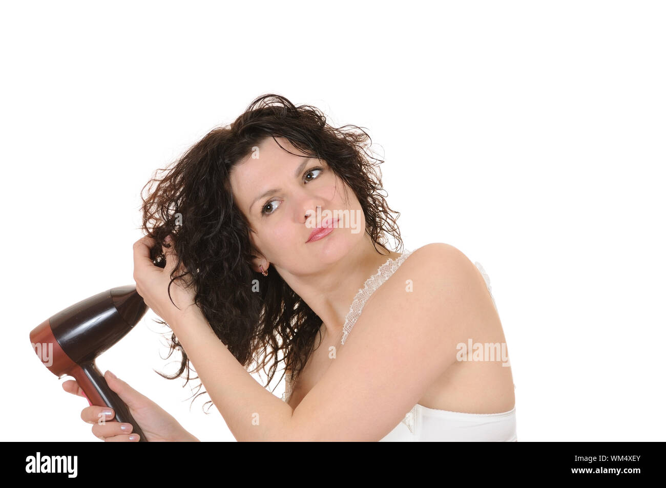 The woman dries the hair dryer hair Stock Photo - Alamy
