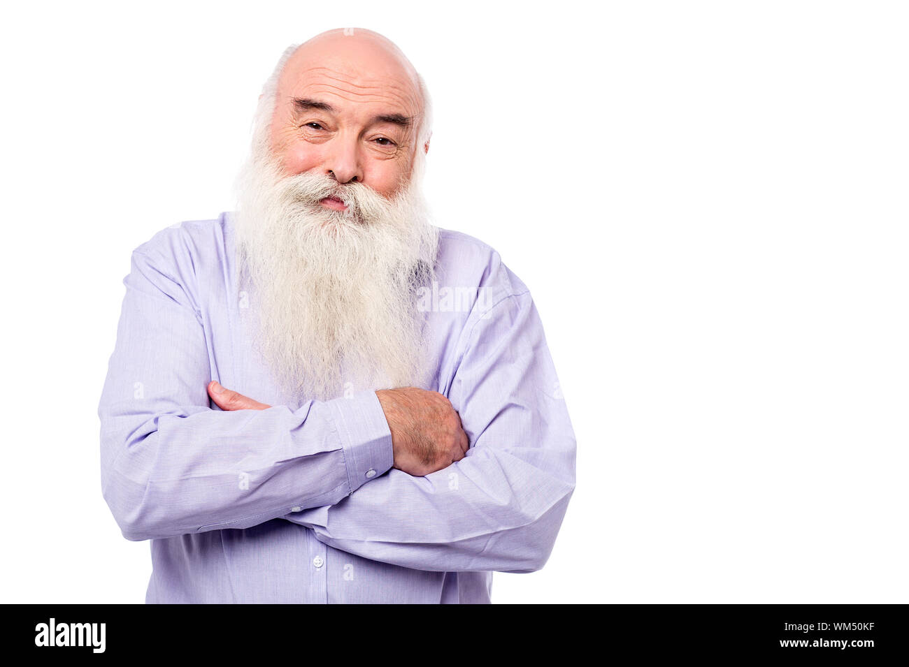 Senior man standing with his arms crossed Stock Photo - Alamy