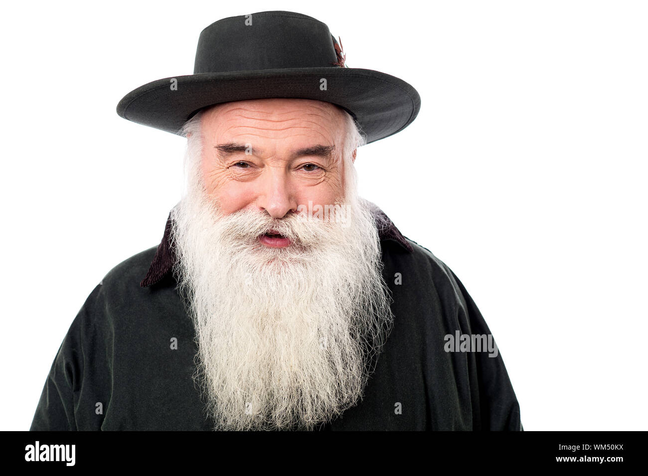 Smiling old man wearing a cowboy hat Stock Photo - Alamy