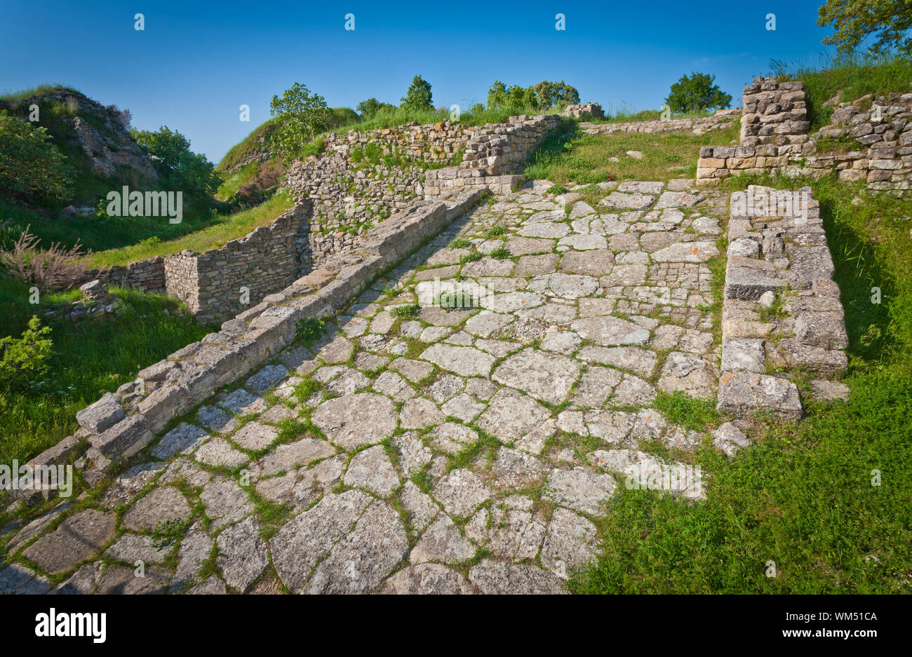 Roadway atop acropolis wall at Troy in Turkey Stock Photo - Alamy