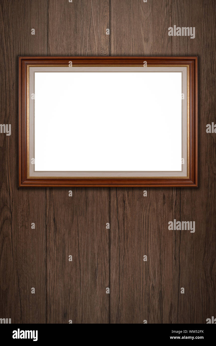 Old picture frame on vintage wood wall Stock Photo - Alamy