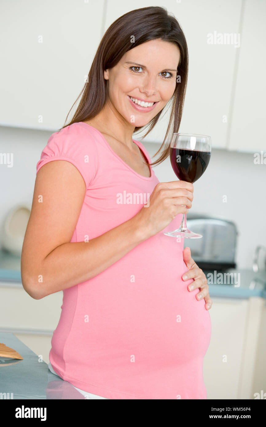 Pregnant Woman Drinking Glass Red High Resolution Stock Photography and