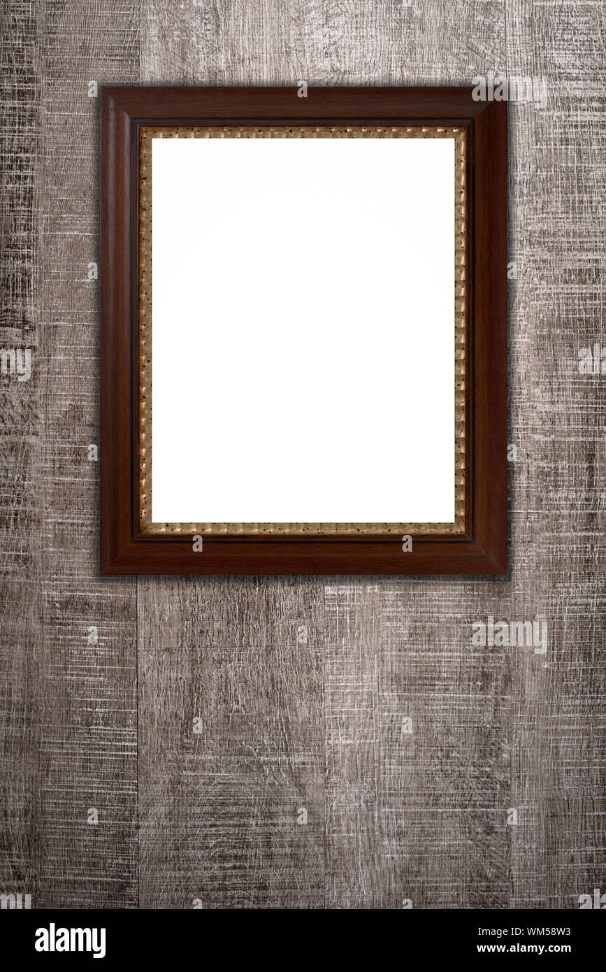 Old picture frame on vintage wood wall Stock Photo - Alamy