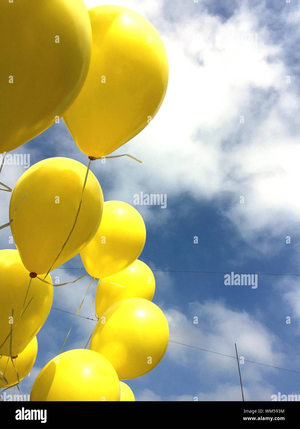 Yellow balloons hires stock photography and images Alamy