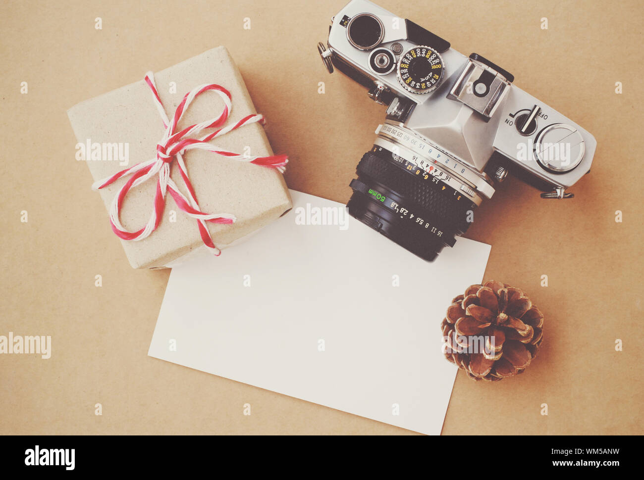 Handmade gift box and film camera on blank card with retro filter ...