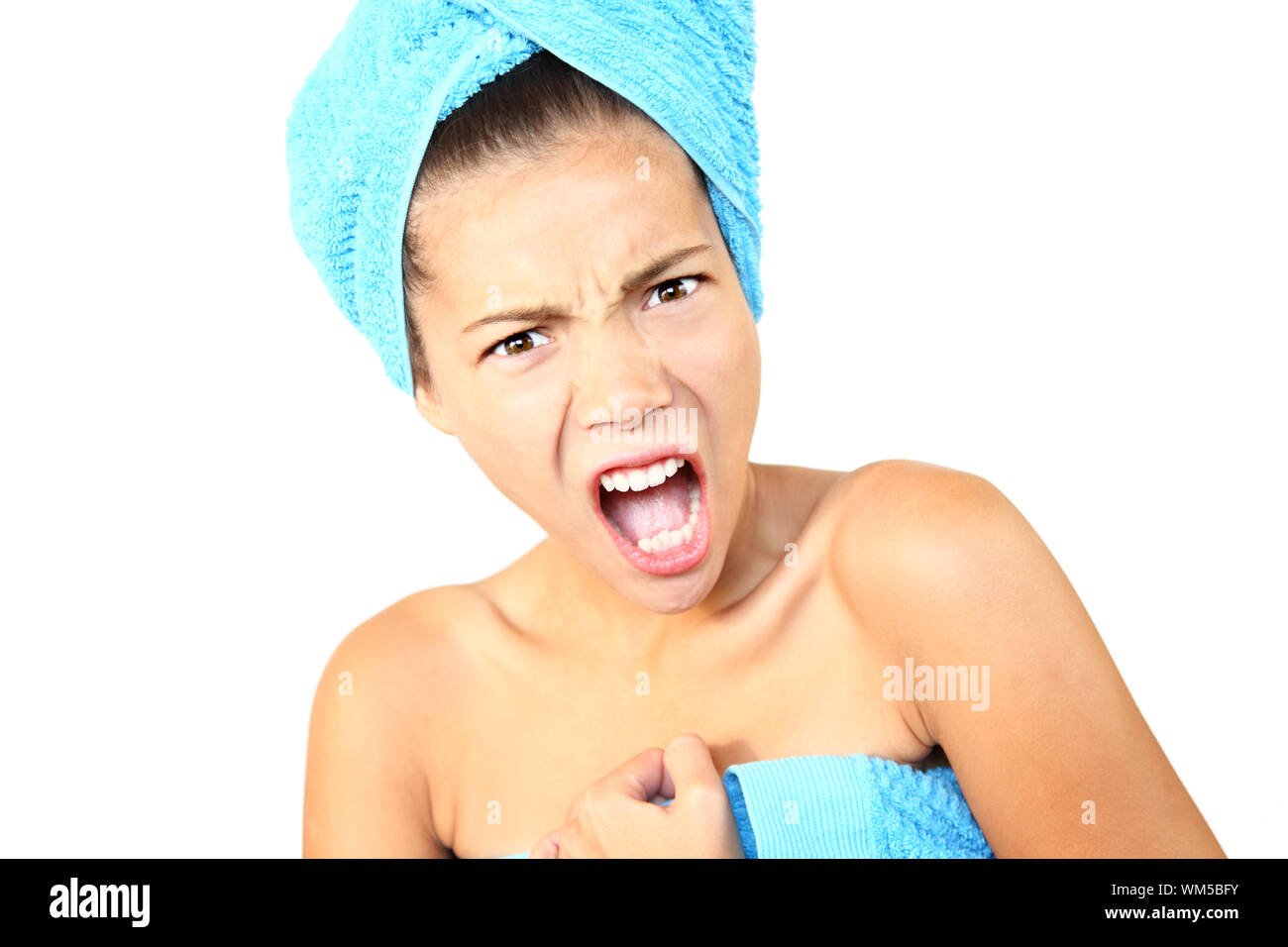 Angry and surprised out of shower woman shocked. Beautiful young woman