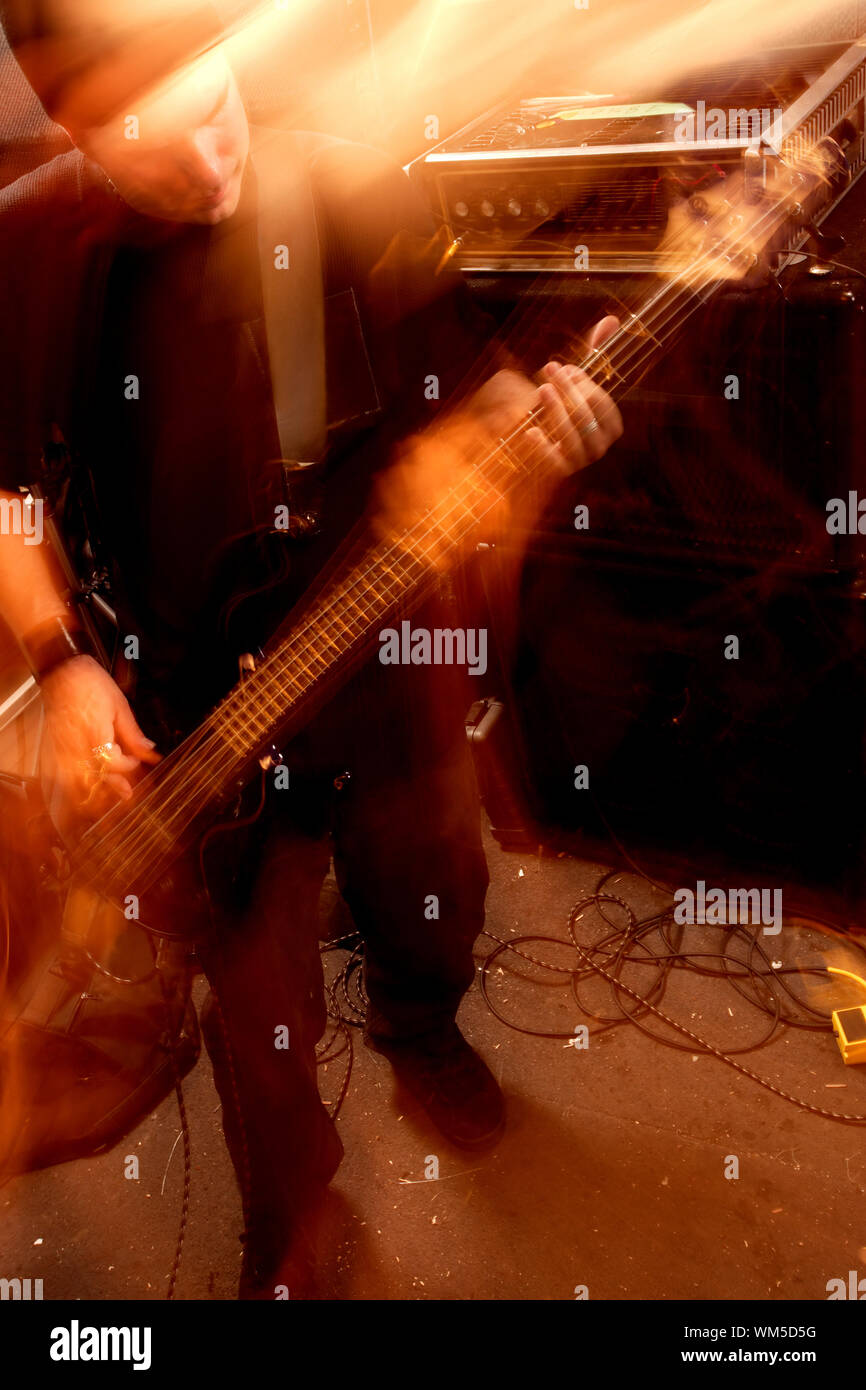 Bass player movement Stock Photo Alamy