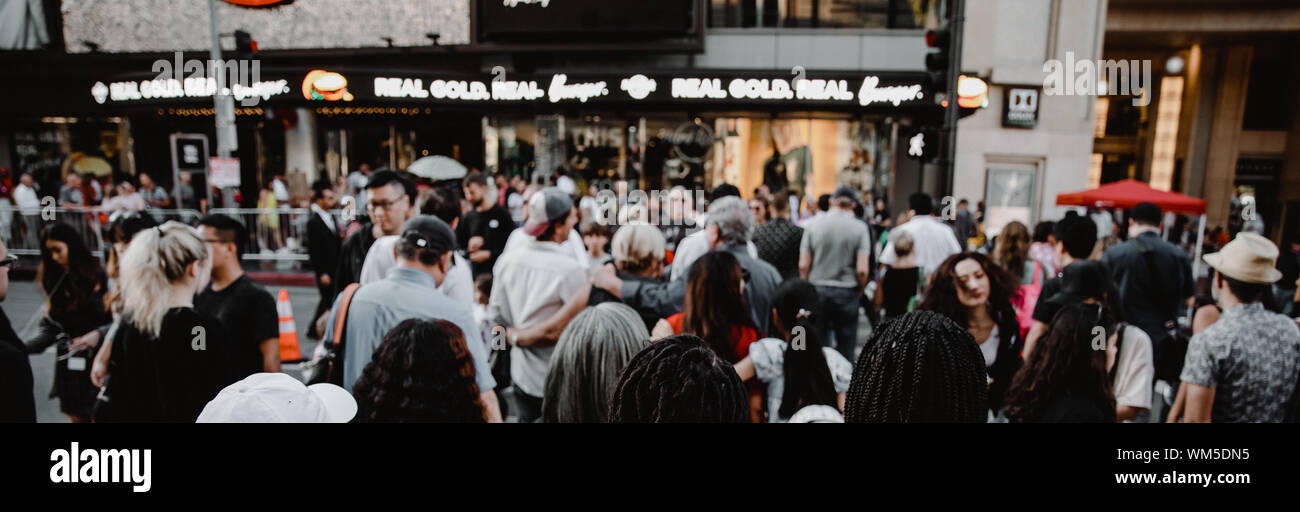 People on street. Panoramic view of crowd walking, crossing the street. Stock Photo