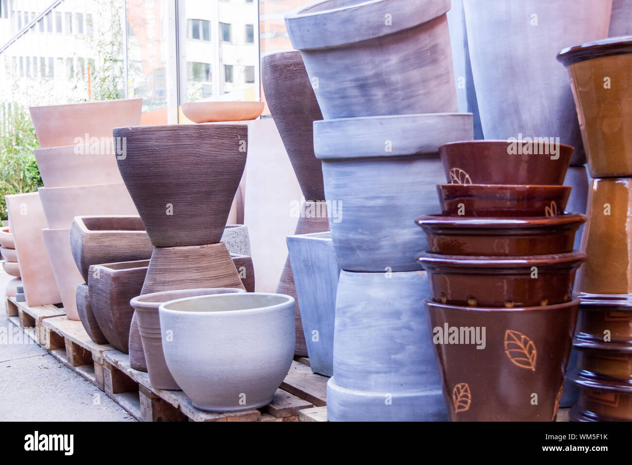 Glazed and unglazed ceramic flower pots Stock Photo Alamy