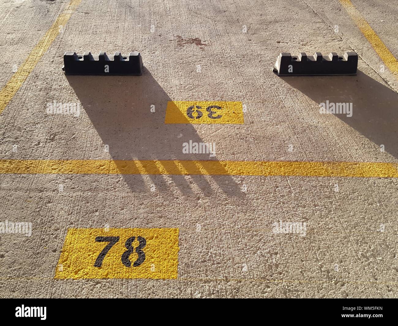Download High Angle View Of Numbers In Parking Lot Stock Photo Alamy Yellowimages Mockups