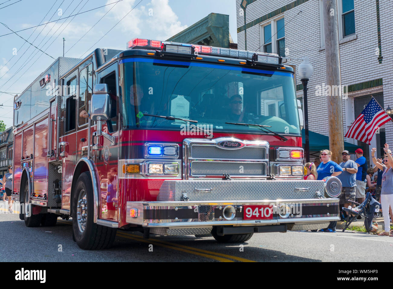 Saint Charles, Missouri 7-4-2019 -USA, Independence day parade, fire engine bringing up the end of the parade. Stock Photo