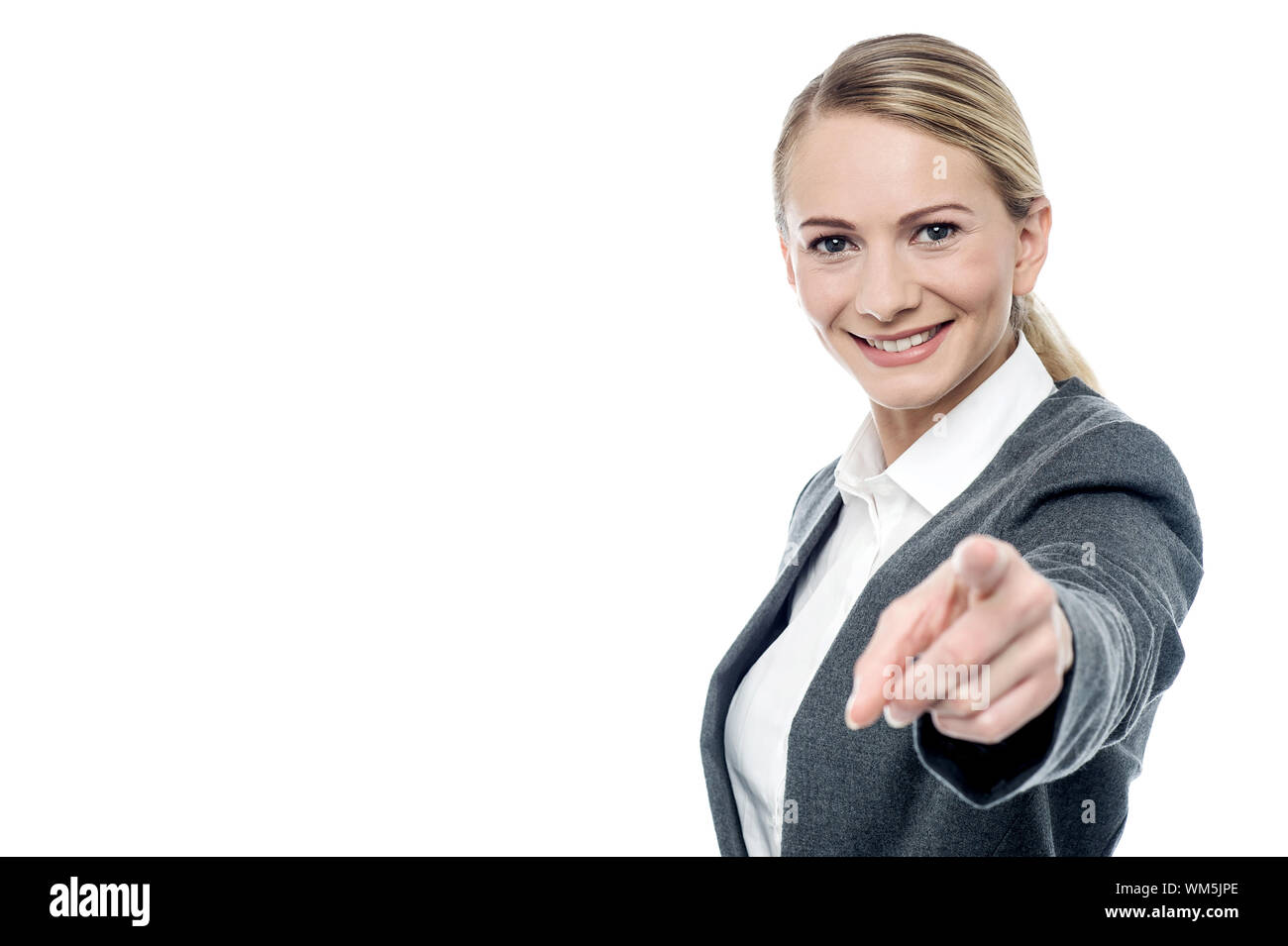 Business executive pointing towards to camera Stock Photo - Alamy