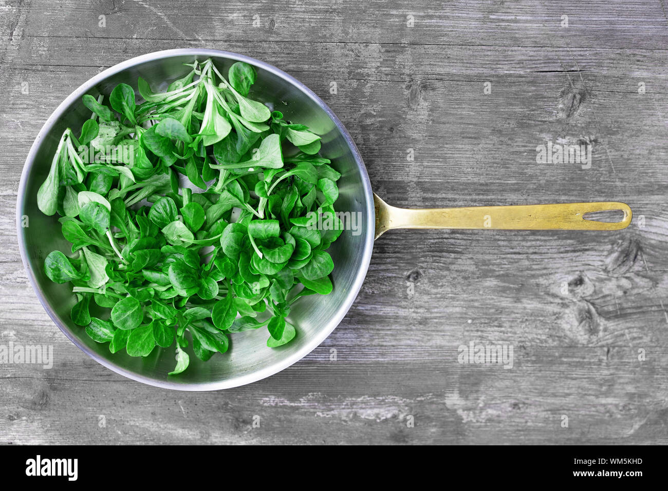 Close-up High Angle View Of Leafy Vegetables In Pan Stock Photo